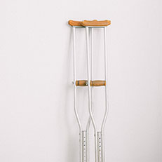 Crutches leaning against a wall