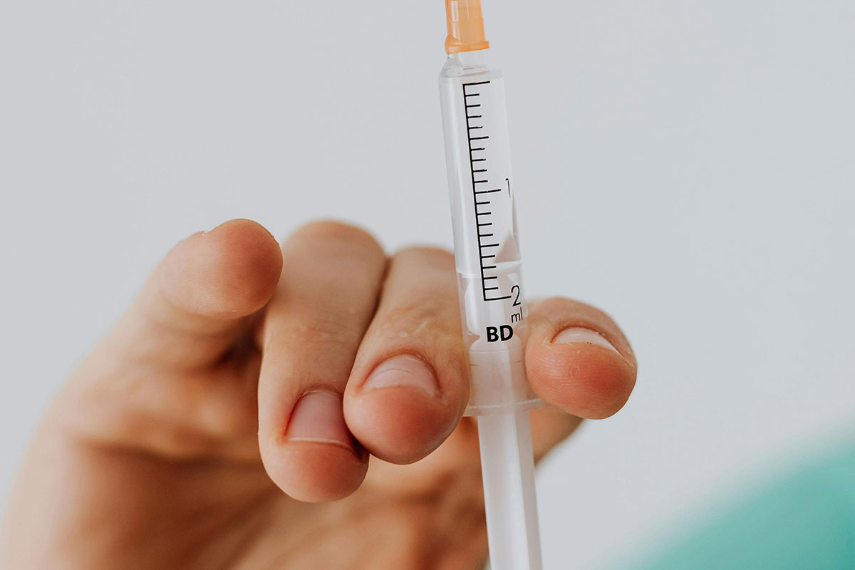 Doctor preparing an injection